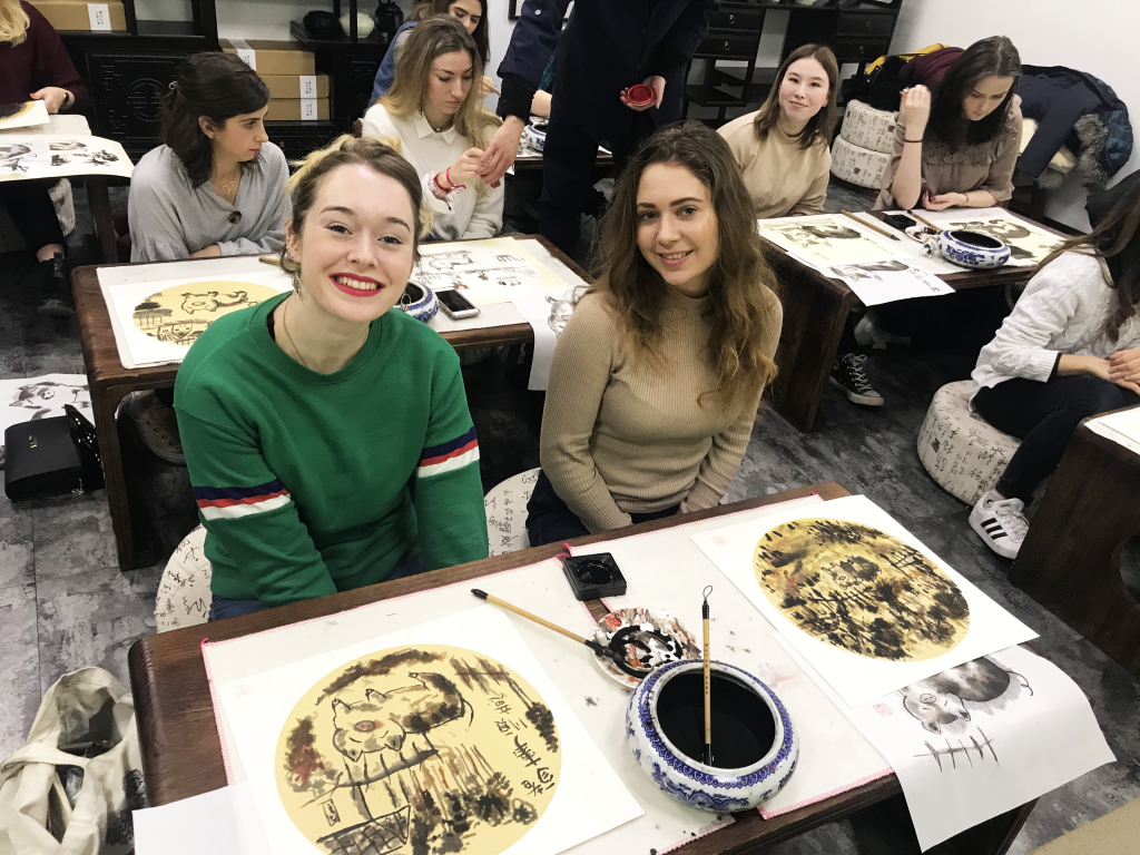 Homestay tutors in Hangzhou enjoying a fun Chinese painting cultural class!